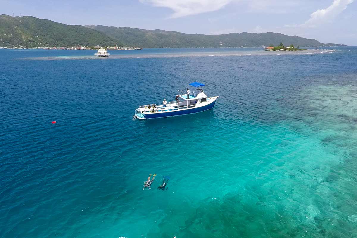 dive boat and two divers